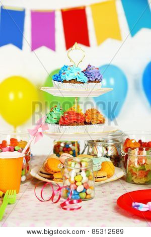 Prepared birthday table with sweets for children party