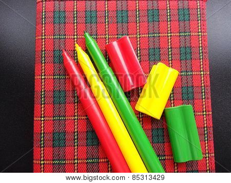 Notebook and felt-tip pens