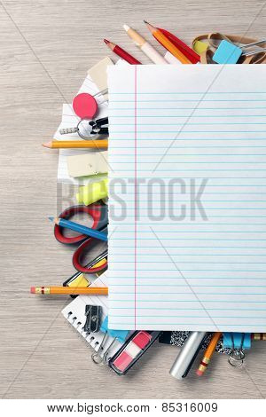 Blank paper on lots of office supplies