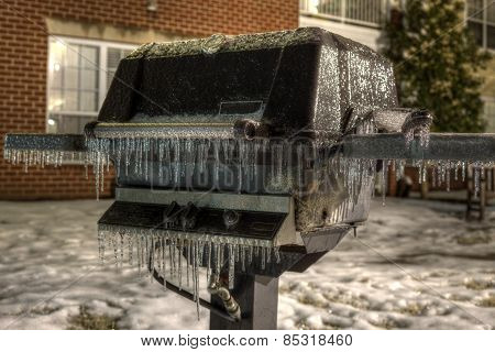Propane Grill Frozen Over with Ice in Winter