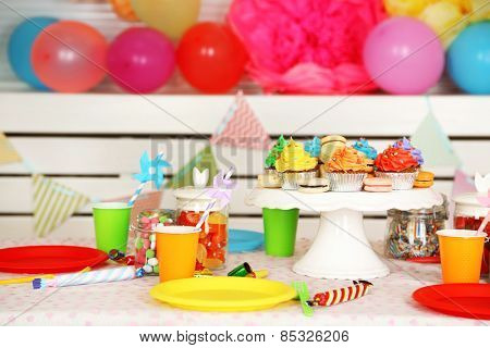 Prepared birthday table with sweets for children party