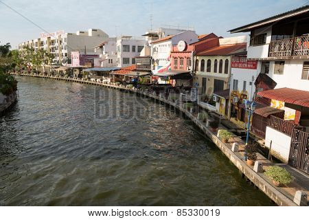 MALACCA, MALAYSIA - JANUARY 29, 2015: On the waterfront Malacca River located hotels, restaurants and cafes. Malacca has been listed as a UNESCO World Heritage Site 2008.