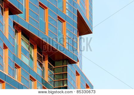 Modern building mirror facade in blue tone