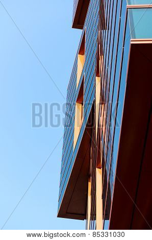 Modern building mirror facade in blue tone