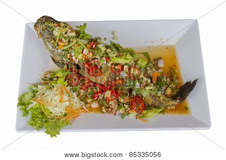 Fish Serve With Herb And Spicy Sauce