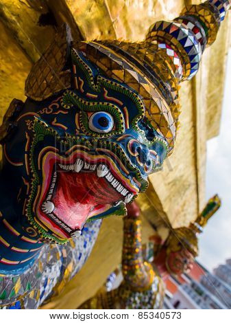 Statue the face giant at Wat Phra Kaew in Bangkok, Thailand