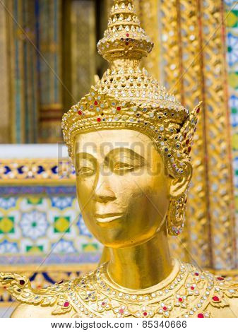 Kinnari statue at Wat Phra Kaew in Grand Palace, Bangkok Thailand.