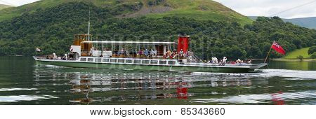 Warm calm summer weather on Monday 30th June 2014 brought visitors to Ullswater Lake District, to ta