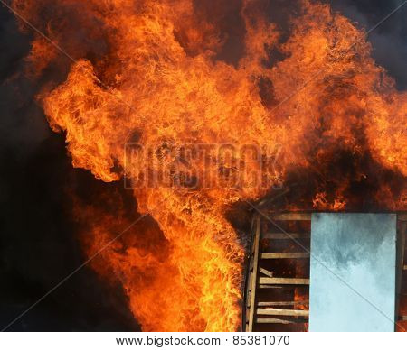 A Wooden House In Flames