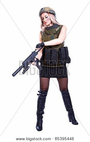 Woman In A Military Camouflage Reloading The Smg