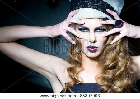 Woman With Shiny Curly Hair And Headpiece.