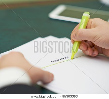 Marking words in an investment definition