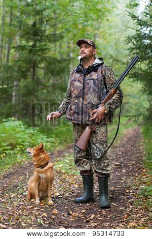 Man With Dog Out Hunting For Hazel Grouse