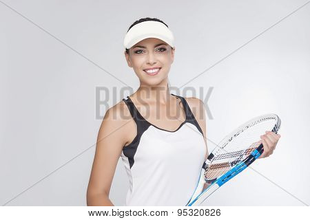 Professional Tennis Concept: Female Tennis Player Equipped In Professional Sport Gear  Holding Racke