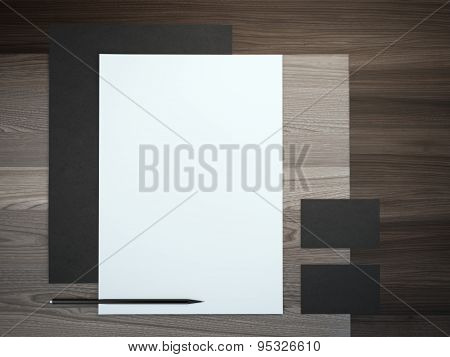 Black branding mockup with pencil