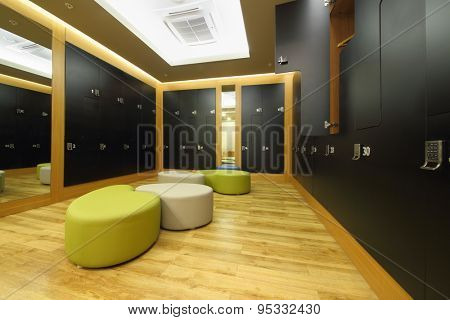 SOCHI, RUSSIA - JUL 27, 2014: The interior of the locker room with black cupboards, mirror and seats in Health spa center in the Hotel Radisson Blu Paradise Resort and Spa