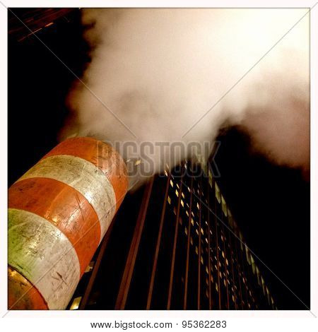 Instagram filtered image of steam coming from an exhaust vent