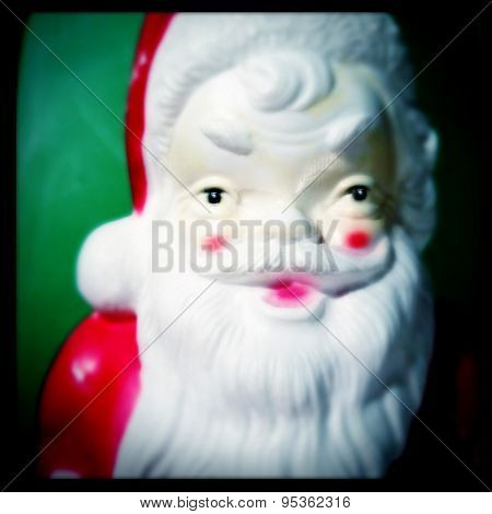 Instagram filtered image of vintage plastic Santa Claus