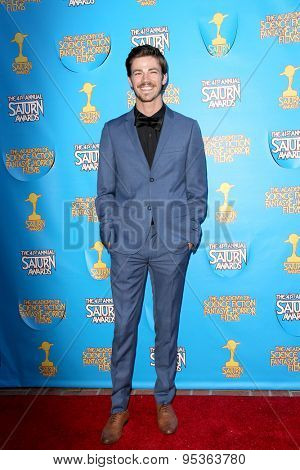 BURBANK - JUNE 25: Grant Gustin arrives at the 41st Annual Saturn Awards on Thursday, June 25, 2015 at the Castaway Restaurant in Burbank, CA.