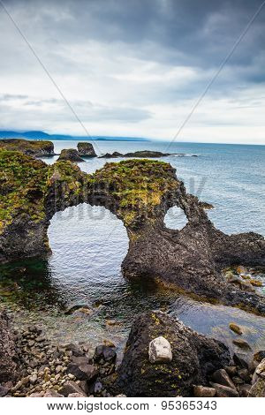 Travel to Iceland in the summer. Picturesque fancy fantastic coastal cliffs Arnastapi