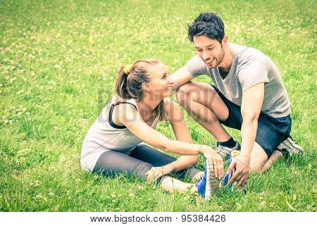 Happy Couple Training In The Park - Young Man And Woman During Summer Workout And Sport Activity