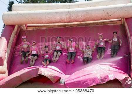 SOUTHAMPTON, UK - JULY 4 : Women gather for the annual Race for Life Pretty Muddy fun run, to raise money for Cancer Research. 4 July 2015 in Southampton, UK.