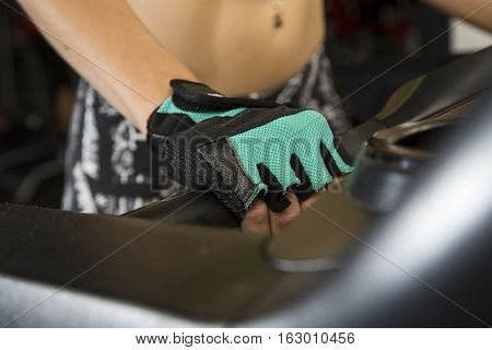 Young Woman Goes In For Sports At Gym