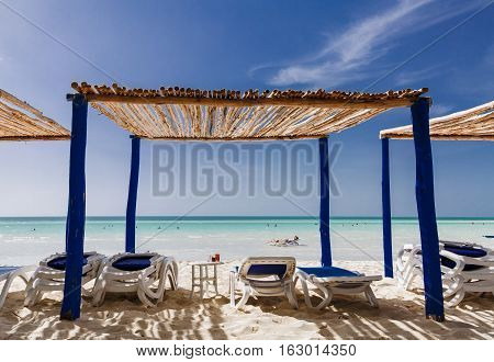 great amazing beautiful view of Cuban Cayo Coco island beach with people relaxing in background on sunny gorgeous day