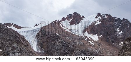 Panoramic view behind Talgar Pass in Tien Shan mountains. Peaks with glaciers Almaty Kazakhstan 2016