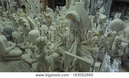 Statues of Hindu Gods and Goddess. Crafts and Arts of India. Murti handmade Manufacturing in Jaipur (Rajasthan). Indian God sculpture made of white marble. Ancient Traditions and Crafts of India