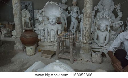 Statues of Hindu Gods and Goddess. Crafts and Arts of India. Murti handmade Manufacturing in Jaipur (Rajasthan). Indian God sculpture made of white marble. Ancient Traditions and Crafts of India