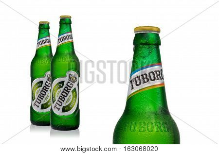 Editorial Photo Of Cold Bottles Of Tuborg Green Beer With Drops Isolated On White
