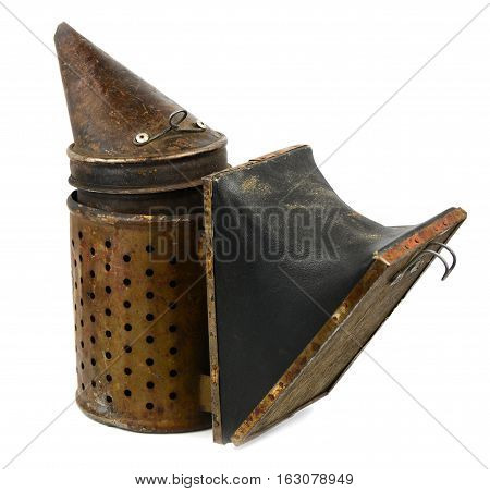 Old bee smoker isolated on white background. Beekeeping tool.