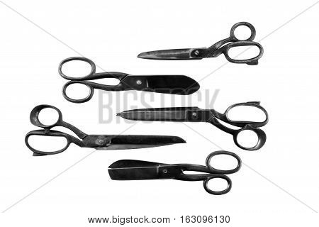 Antique rusty scissors isolated on white background