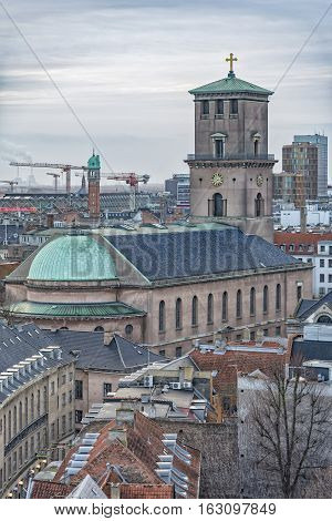 COPENHAGEN DEMARK - DECEMBER 23 2016: The Church of Our Lady is the cathedral of Copenhagen. It is situated on Frue Plads and next to the main building of the University of Copenhagen.