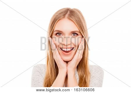 Surprised Pretty Young Woman Holding Hands Near Face