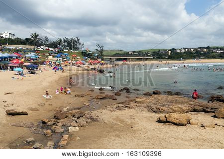 People On Early Morning Beach At Scottburgh In  South Africa
