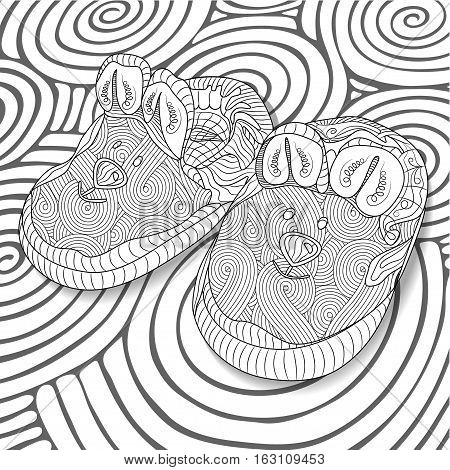 Doodle sketch of baby bootees in black and white zentangle design. Coloring book for adult and older children. Hand drawn vector illustration.