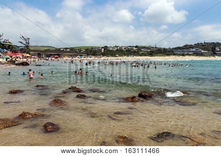 People On Early Morning Beach At Scottburgh In  South Africa