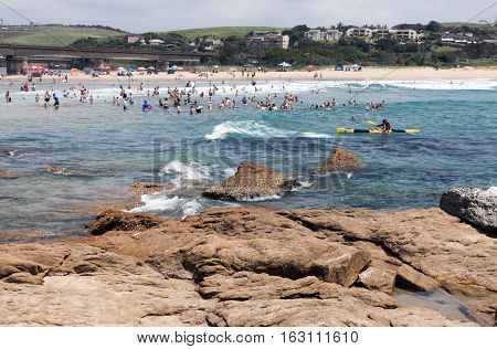 People On Early Morning Beach At Scottburgh In  South Africa