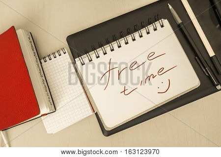 notebook for notes lying on the office desk