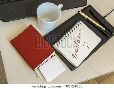 notebook for notes lying on the office desk