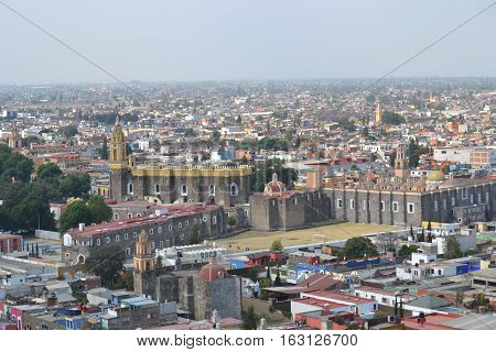 View of the city of Cholula from the top of a pyramid. The city has over 365 church so no matter where you look you will see one or more. Puebla, Mexico