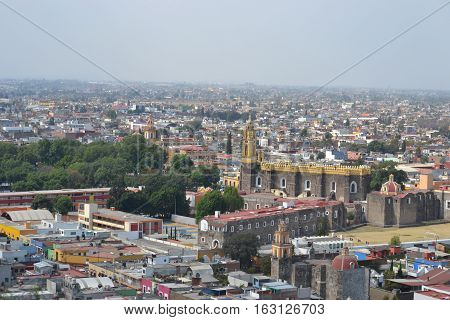 View of the city of Cholula from the top of a pyramid. The city has over 365 church so no matter where you look you will see one or more. Puebla, Mexico