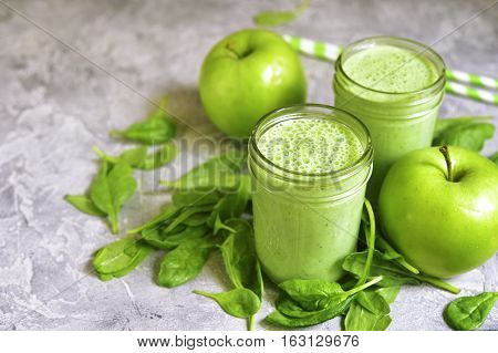 Spinach Apple Smoothie In A Mason Jar.