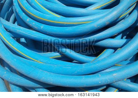 Close-up to focus on blue hose background