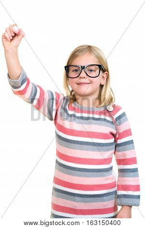 education, school and imaginary screen concept - cute little girl drawing in the air or imaginary screen