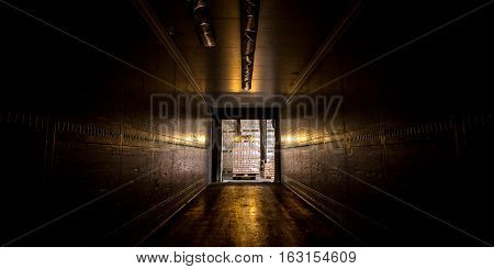 loading empty truck with goods from a storage