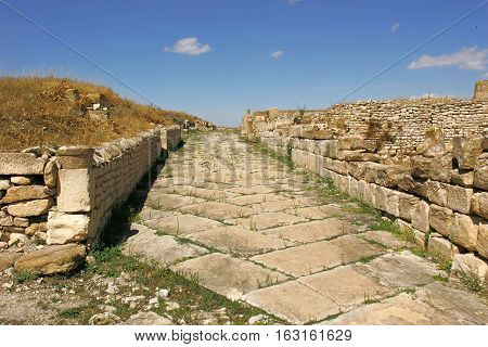 The road to the ruins of the ancient city  Maktar Tunisia
