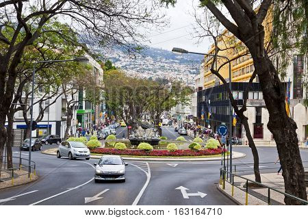 FUNCHAL PORTUGAL - JUNE 14 2013: Avenida Arriaga street in the center of Funchal city the capital of Madeira island Atlantic ocean Portugal